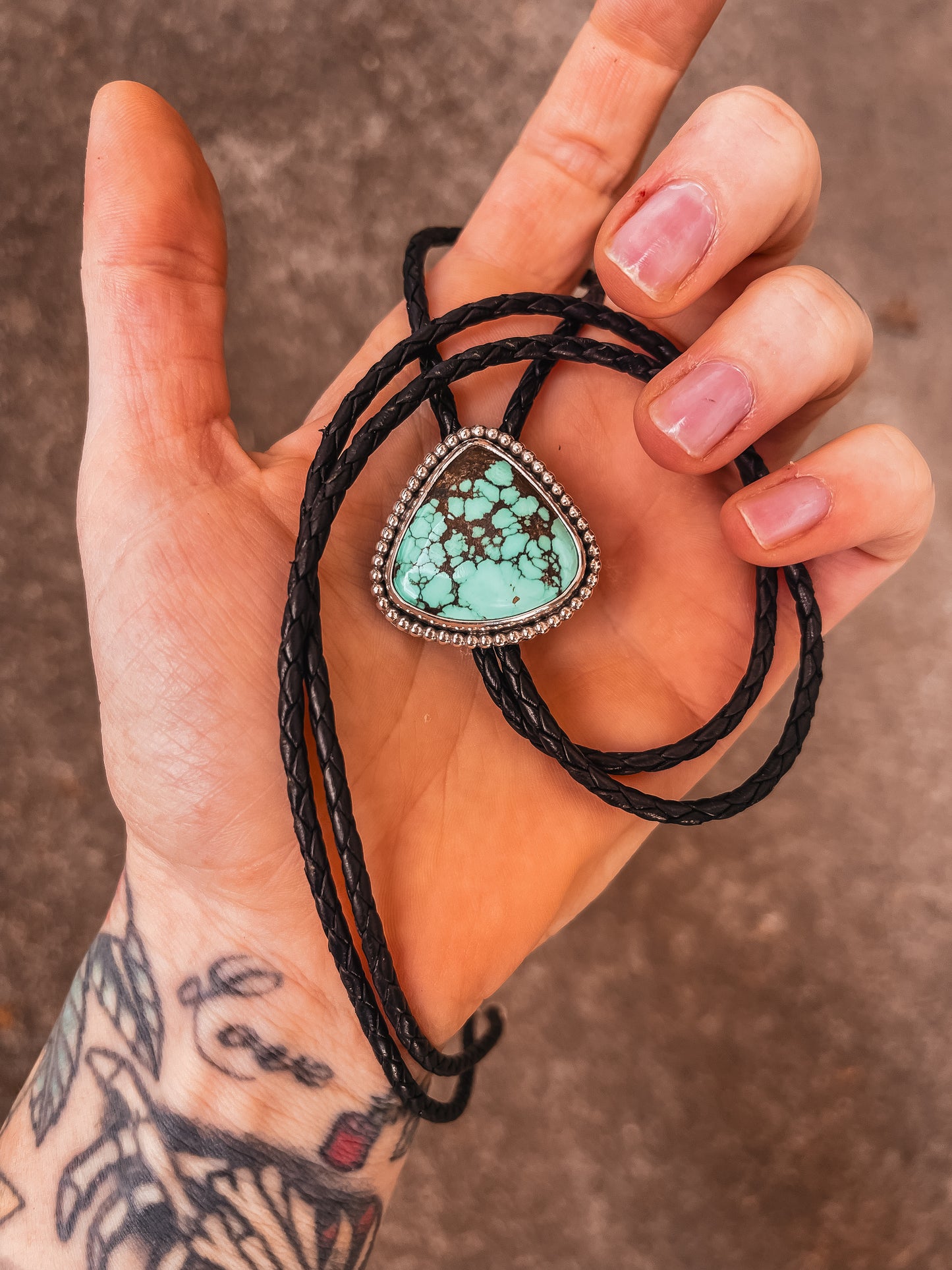 Hubei Turquoise & Black Leather Braided Cord Bolo Tie